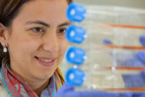 Dr. Daniela Bota analyzes test tubes