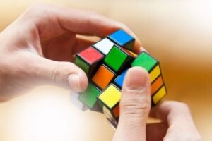 Someone solving a Rubix cube