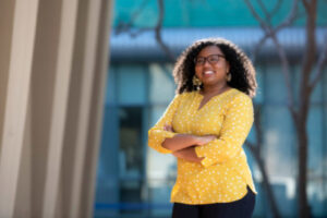 Headshot of Angeline Dukes in front of McGaugh Hall.