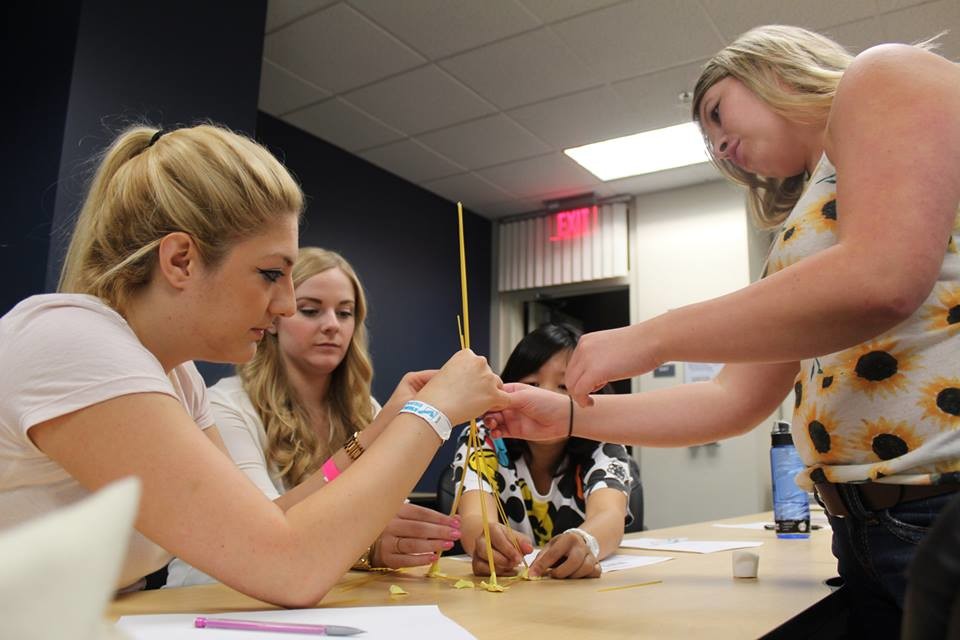 Students for Industrial/Organizational Psychology (SIOP) build a structure using pasta noodles.