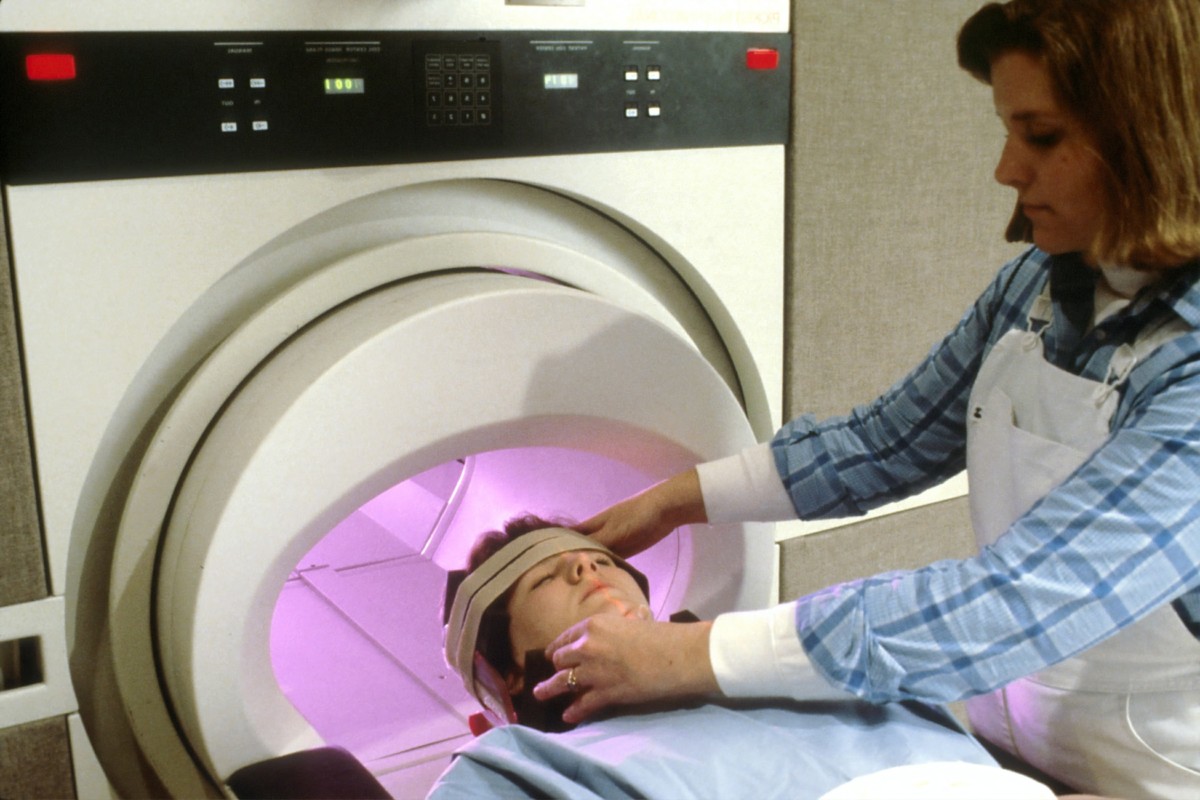 A person gets an MRI scan
