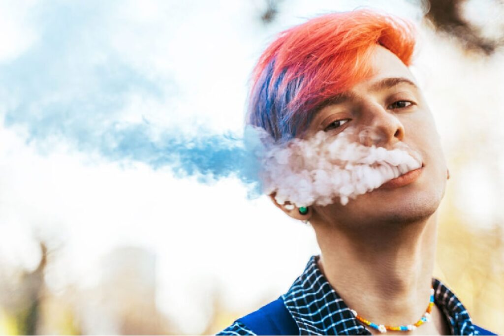 Warning! Nicotine poses special risks to teens - Image of teen vaping